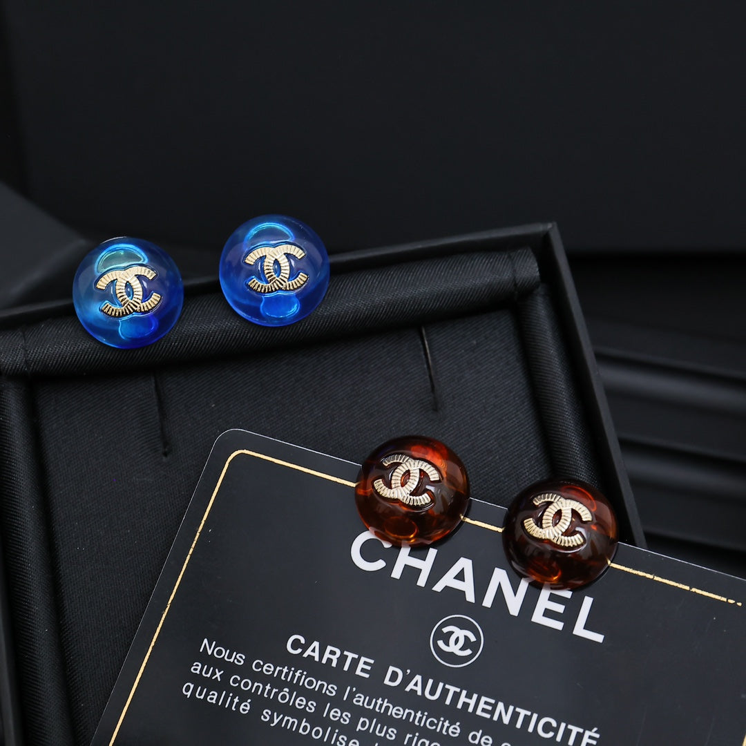 Signature Emblem Stud Earrings in Polished Metal-Tone – Blue Detail styled product view