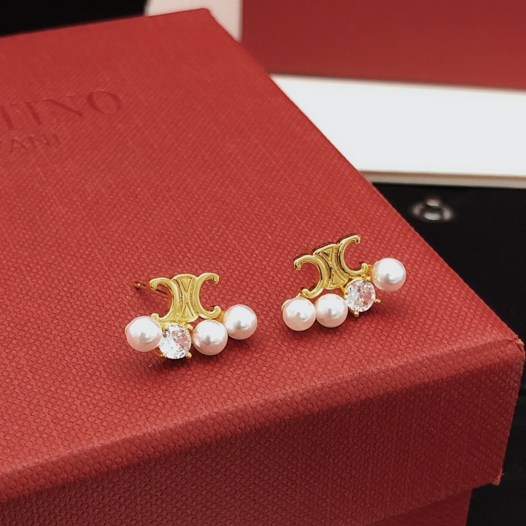 Mini Mini Stud Earrings styled detail