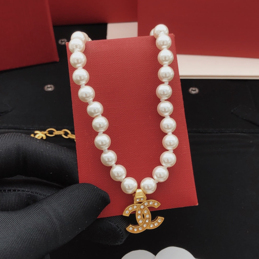 Double-C Emblem Pearl-Detail Pendant Necklace – Pearl Detail – Design 110 front product view