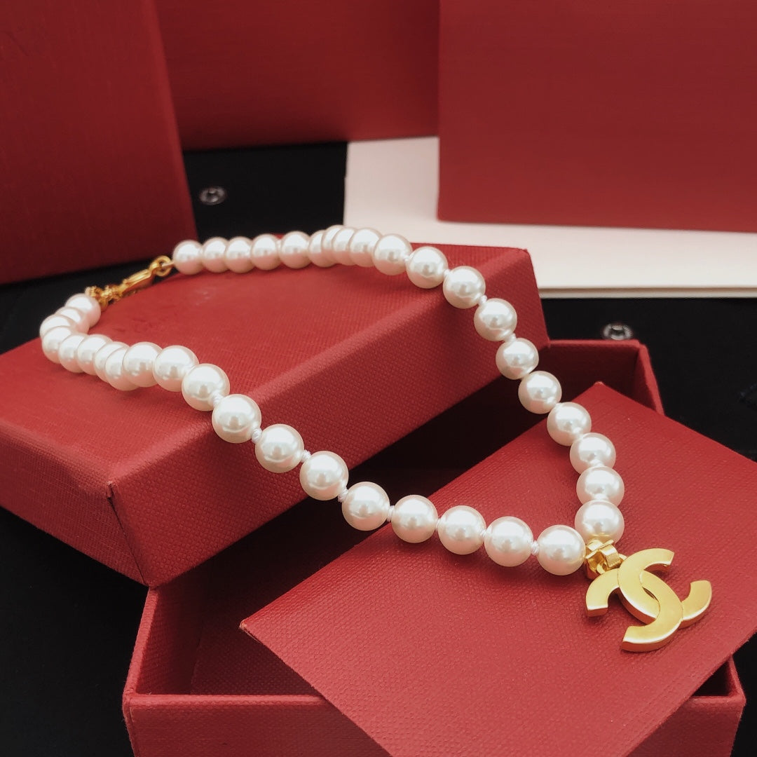 Double-C Emblem Pearl-Detail Pendant Necklace – Pearl Detail – Design 110 close-up detail