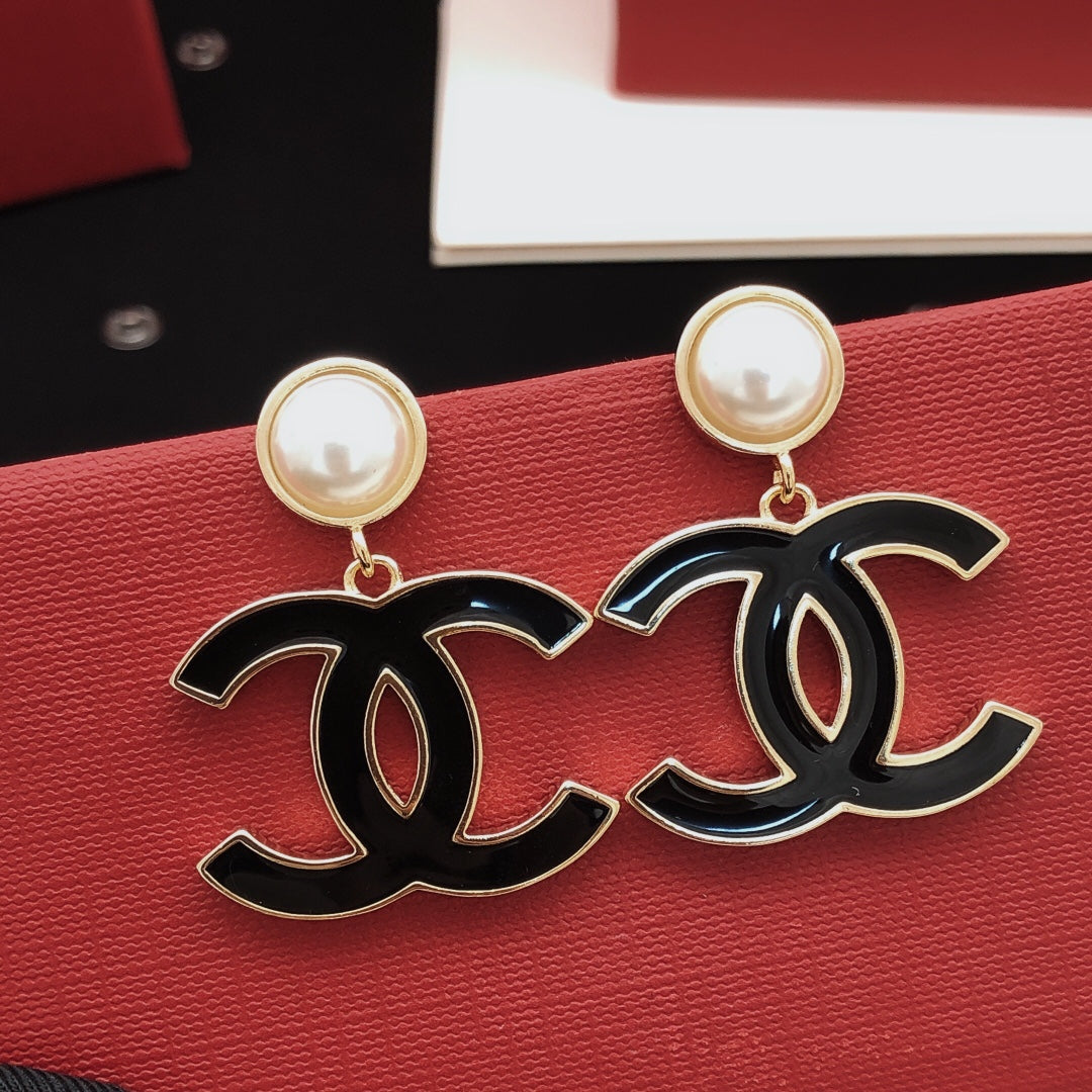 Signature Emblem Stud Earrings in Gold-Tone – Black Detail – Design 002 side detail