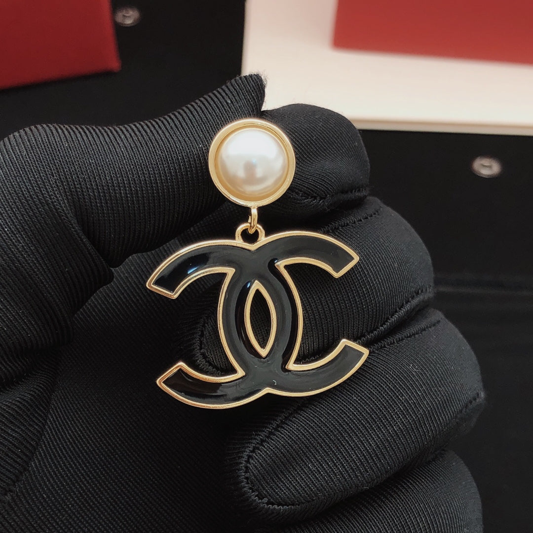 Signature Emblem Stud Earrings in Gold-Tone – Black Detail – Design 002 close-up detail