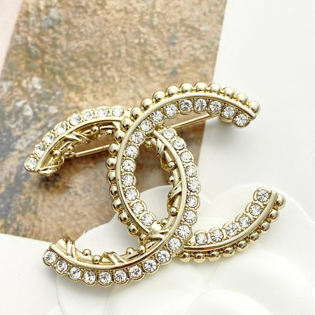 Double-C Emblem Brooch in Polished Metal-Tone – Design 062 main product view
