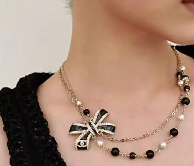 Bow Pearl-Detail Pendant Necklace – Pearl Detail – Design 010 detail view
