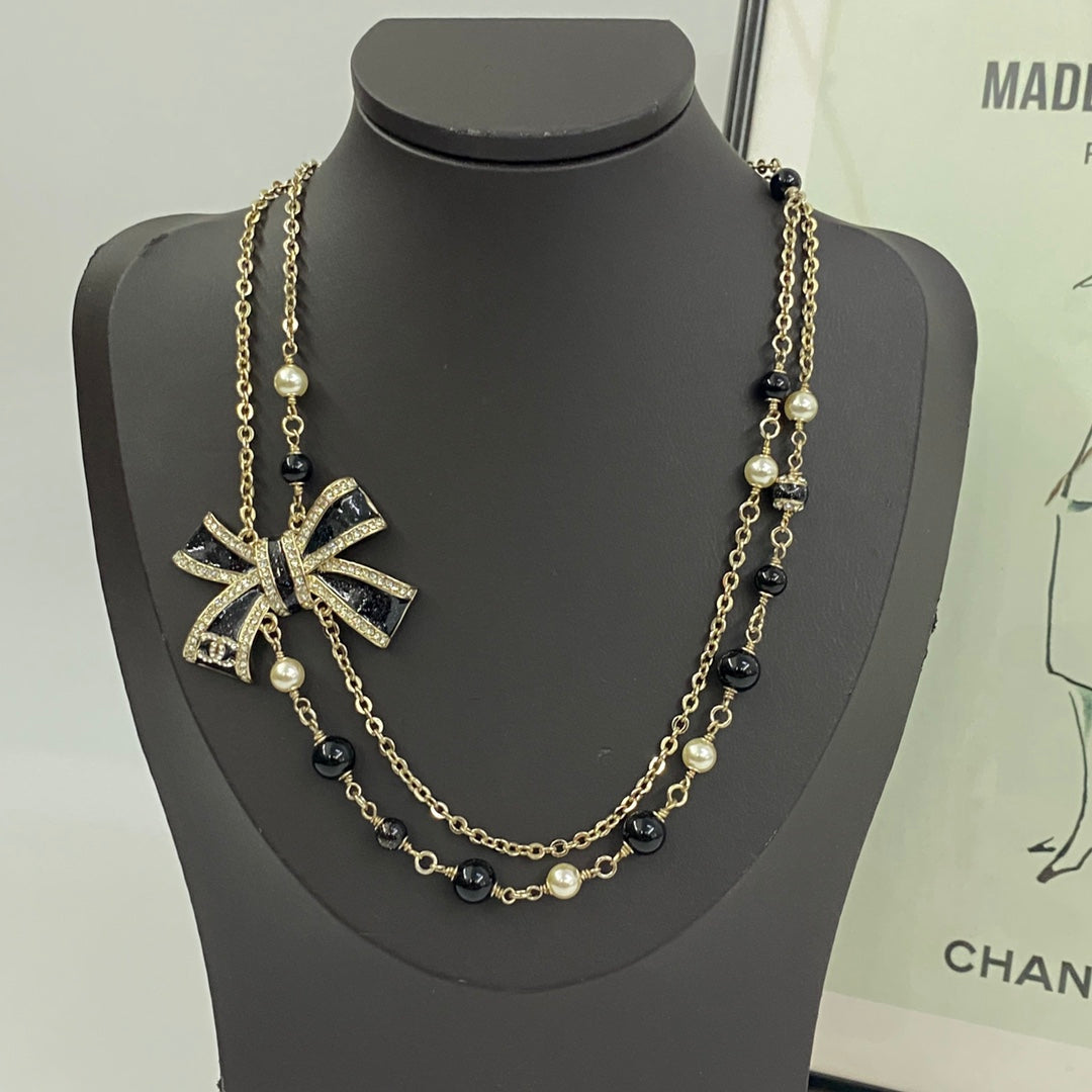 Bow Pearl-Detail Pendant Necklace – Pearl Detail – Design 010 main product view