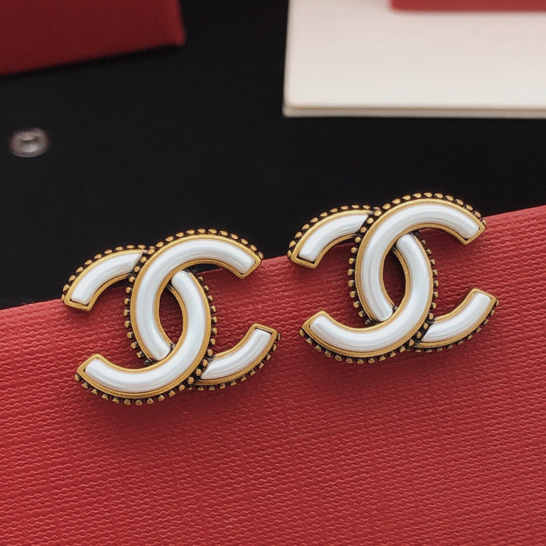 Double-C Emblem Stud Earrings in Gold-Tone – White Detail main product view
