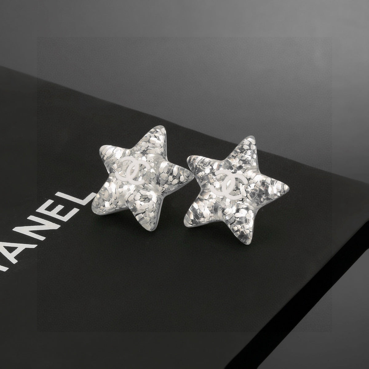 Double-C Emblem Stud Earrings in Silver-Tone – Star Detail – Design 004 front product view