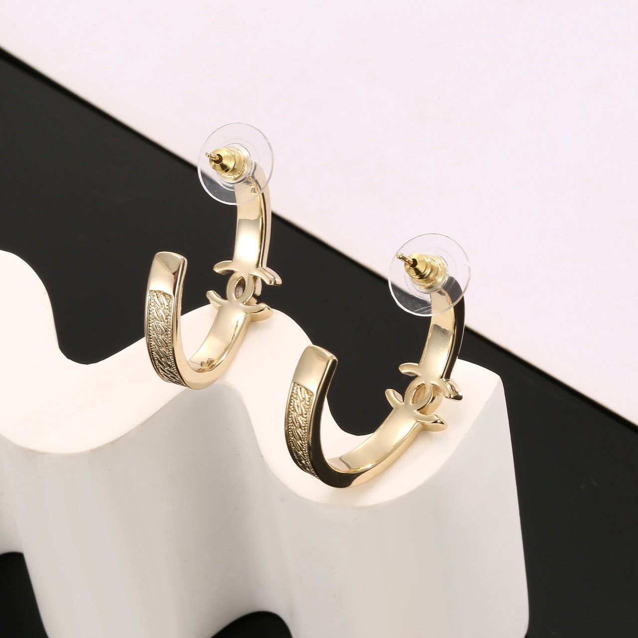 Signature Emblem Stud Earrings in Polished Metal-Tone – Design 018 close-up detail