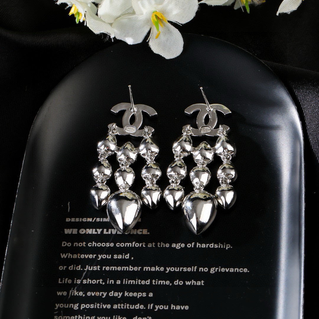 Signature Emblem Crystal-Accent Stud Earrings – Design 023 close-up detail