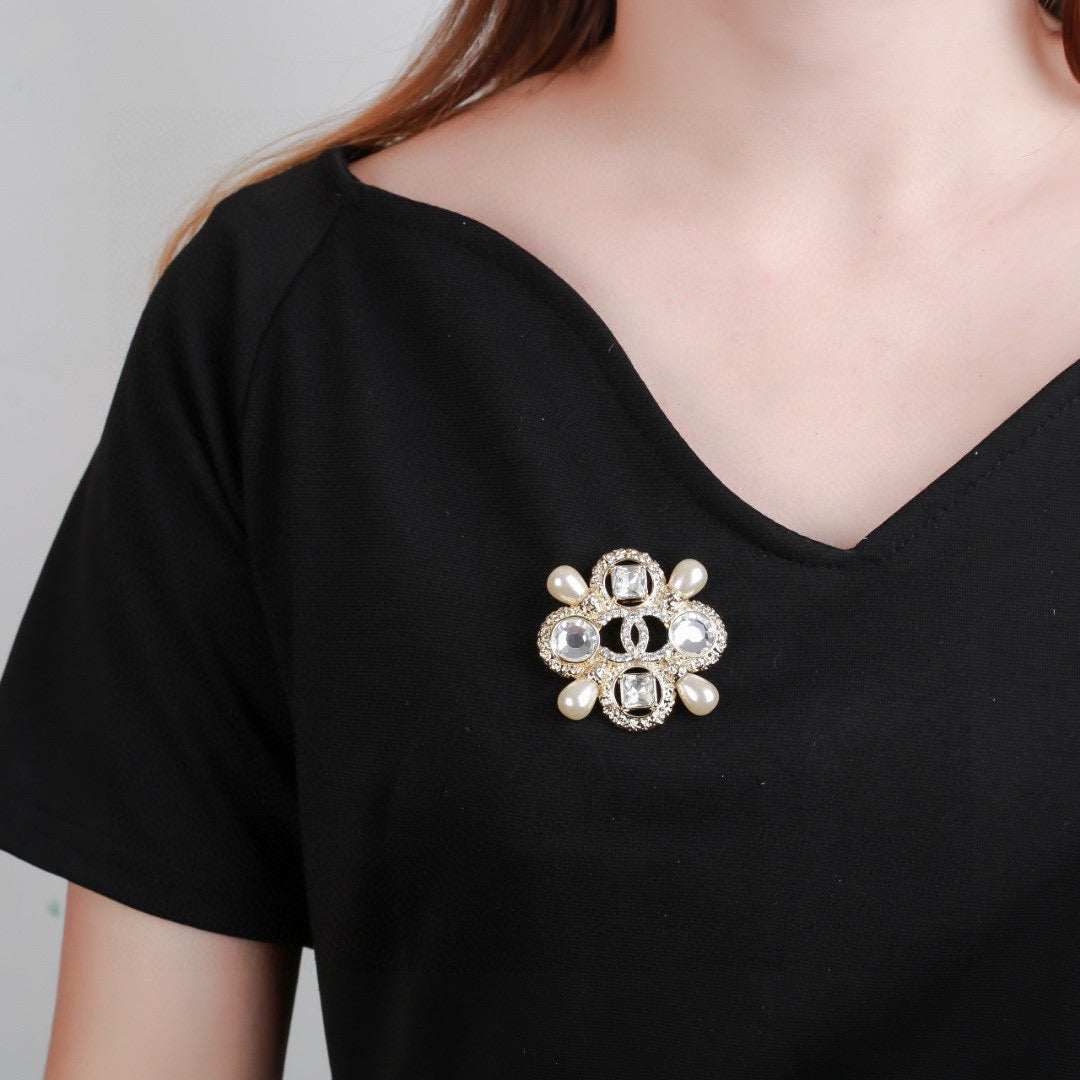 Signature Emblem Brooch in Polished Metal-Tone – Design 043 front product view