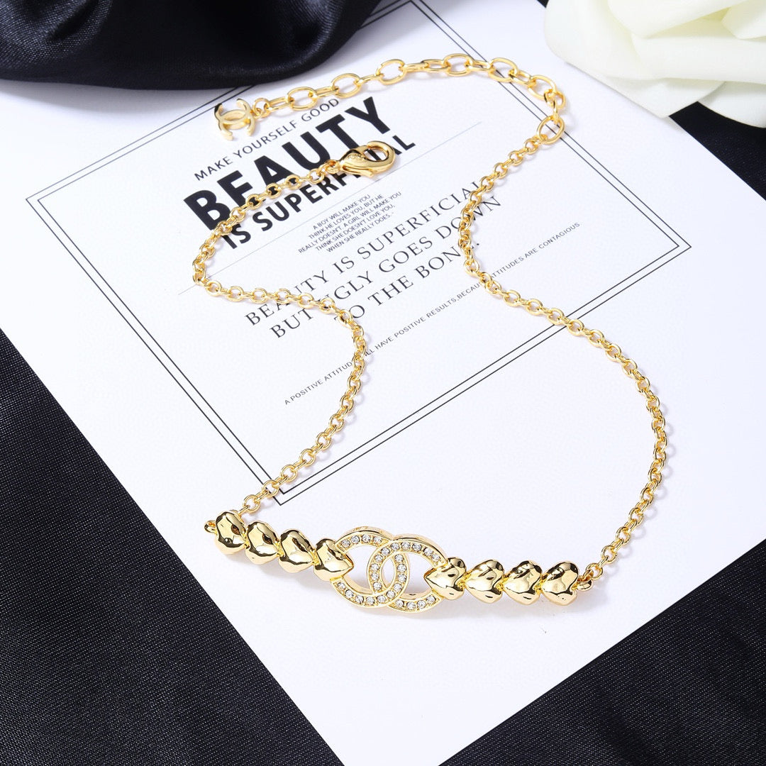 Double-C Emblem Pendant Necklace in Gold-Tone – Design 009 main product view