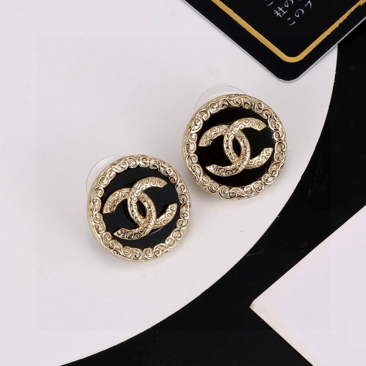 Double-C Emblem Stud Earrings in Black-Tone – Black Detail detail view