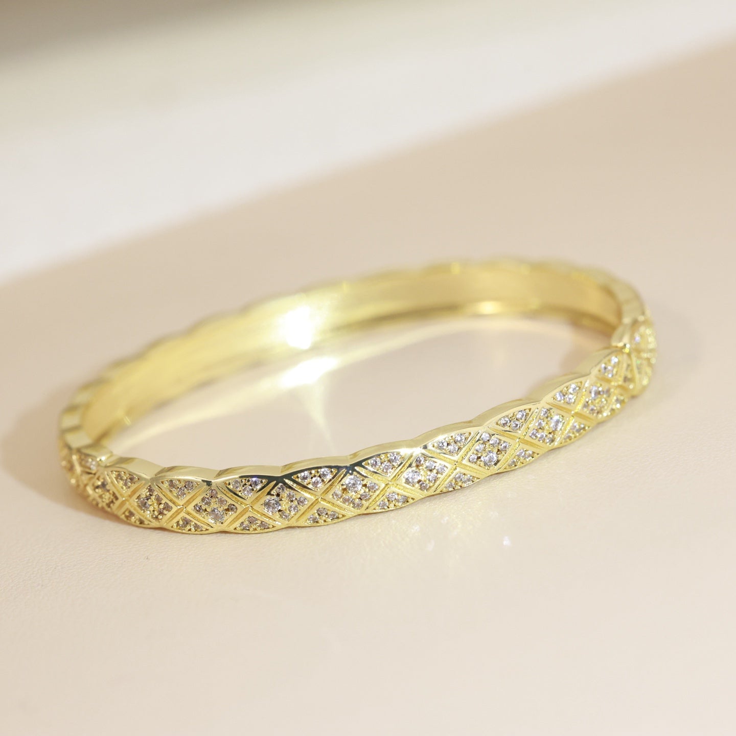 Double-C Emblem Bangle in Silver-Tone close-up detail