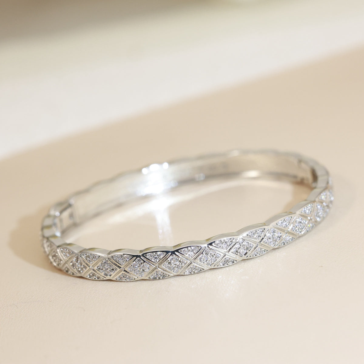 Double-C Emblem Bangle in Silver-Tone styled product view