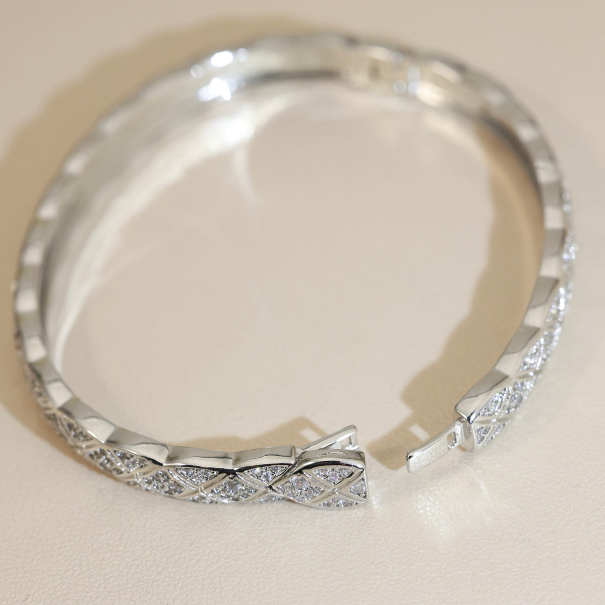 Double-C Emblem Bangle in Silver-Tone detail view