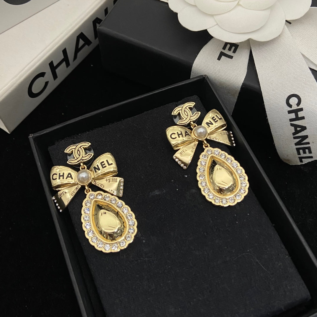 Bow Stud Earrings in Polished Metal-Tone – Design 001 front product view