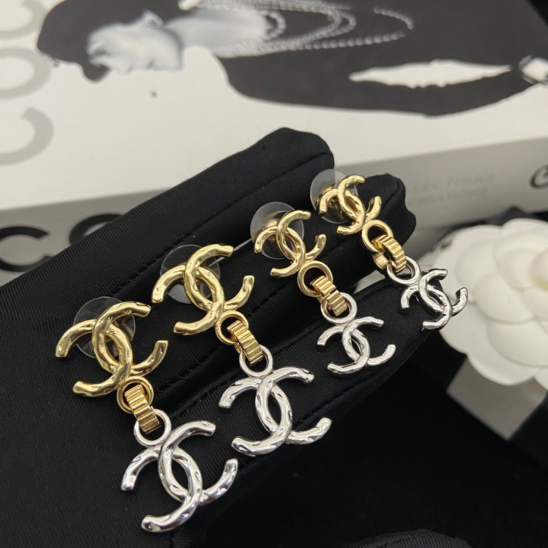 Double-C Emblem Stud Earrings in Polished Metal-Tone – Design 204 front product view