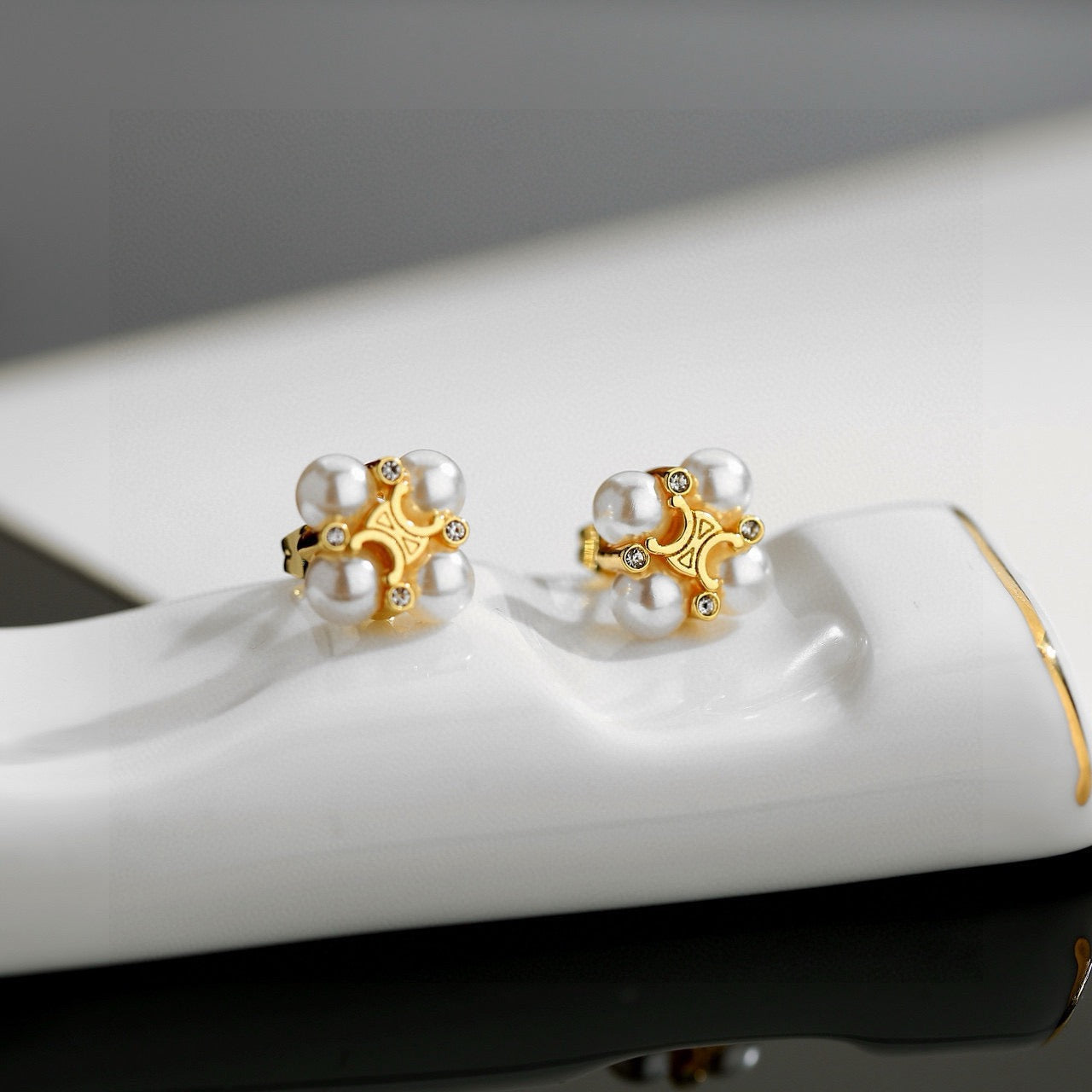 Signature Emblem Stud Earrings in Gold-Tone – Design 03 styled detail