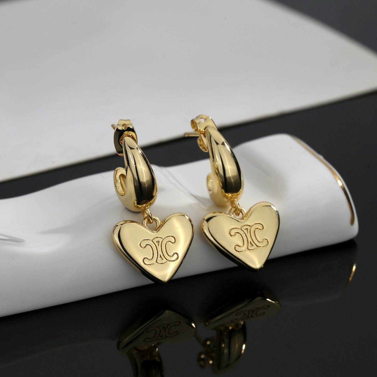 Signature Emblem Stud Earrings in Gold-Tone – Design 02 side detail