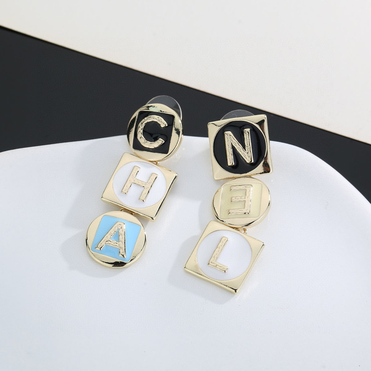 Signature Emblem Stud Earrings in Gold-Tone – Design 024 close-up detail