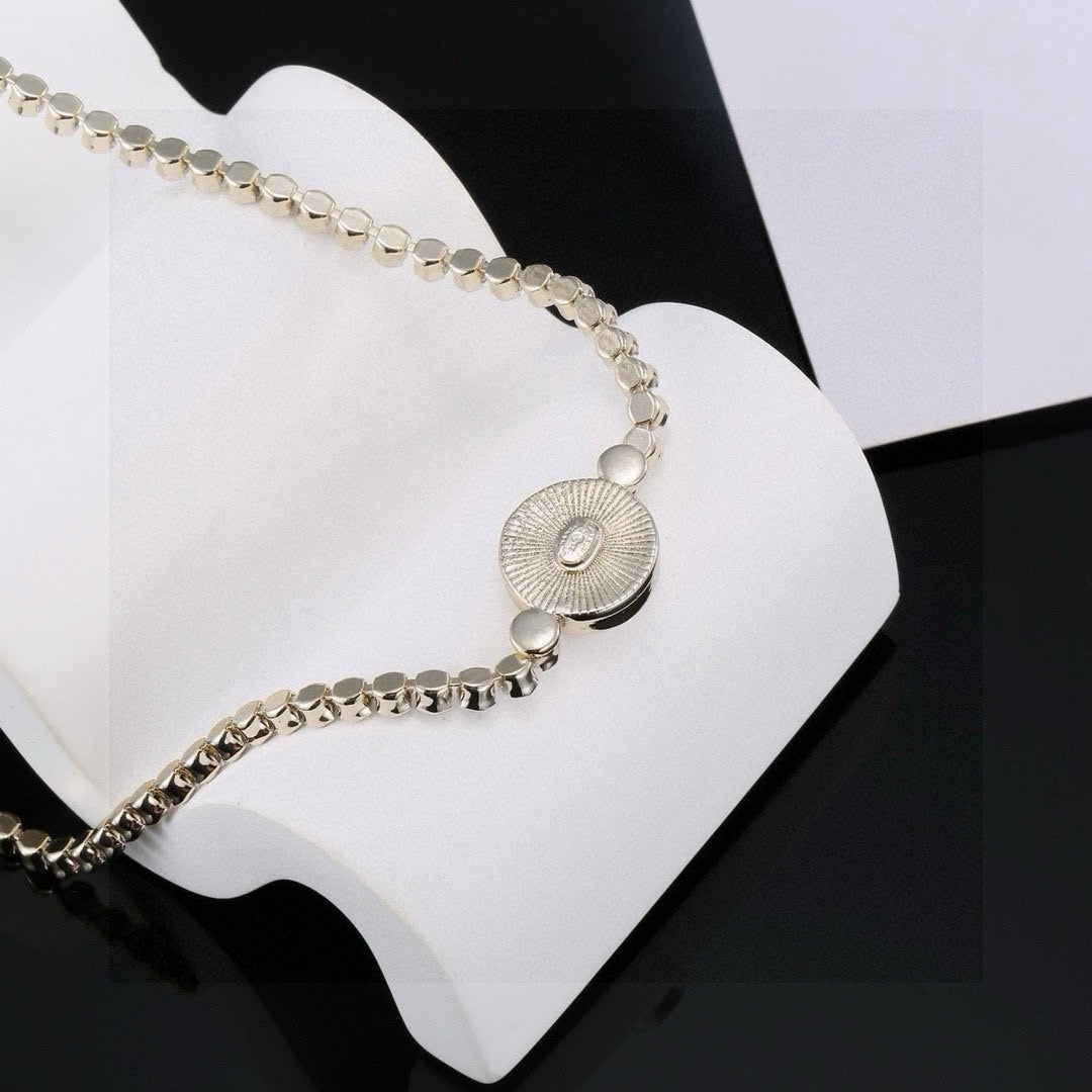 Double-C Emblem Bracelet in Gold-Tone – Design 004 front product view