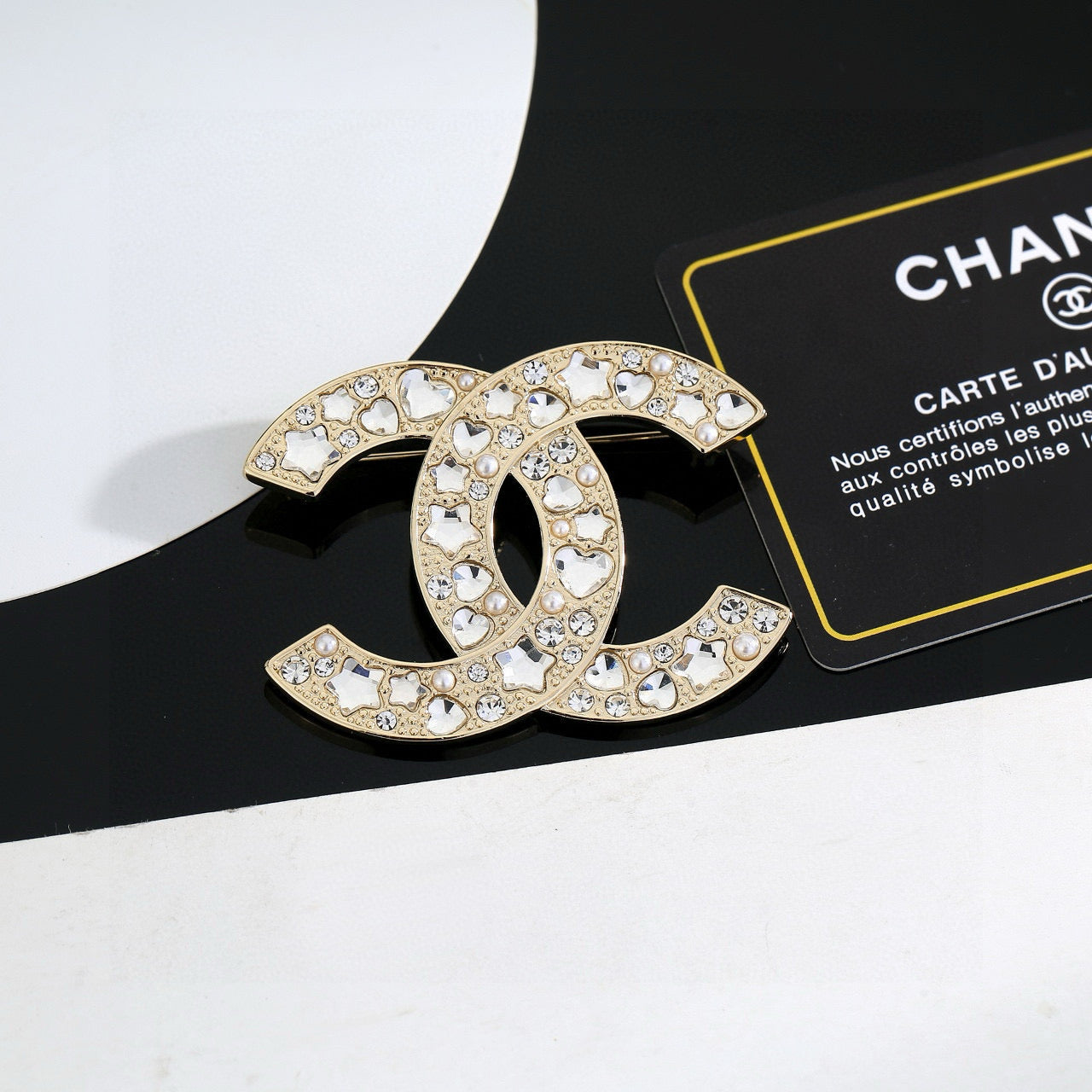 Double-C Emblem Brooch in Gold-Tone – Design 011 detail view