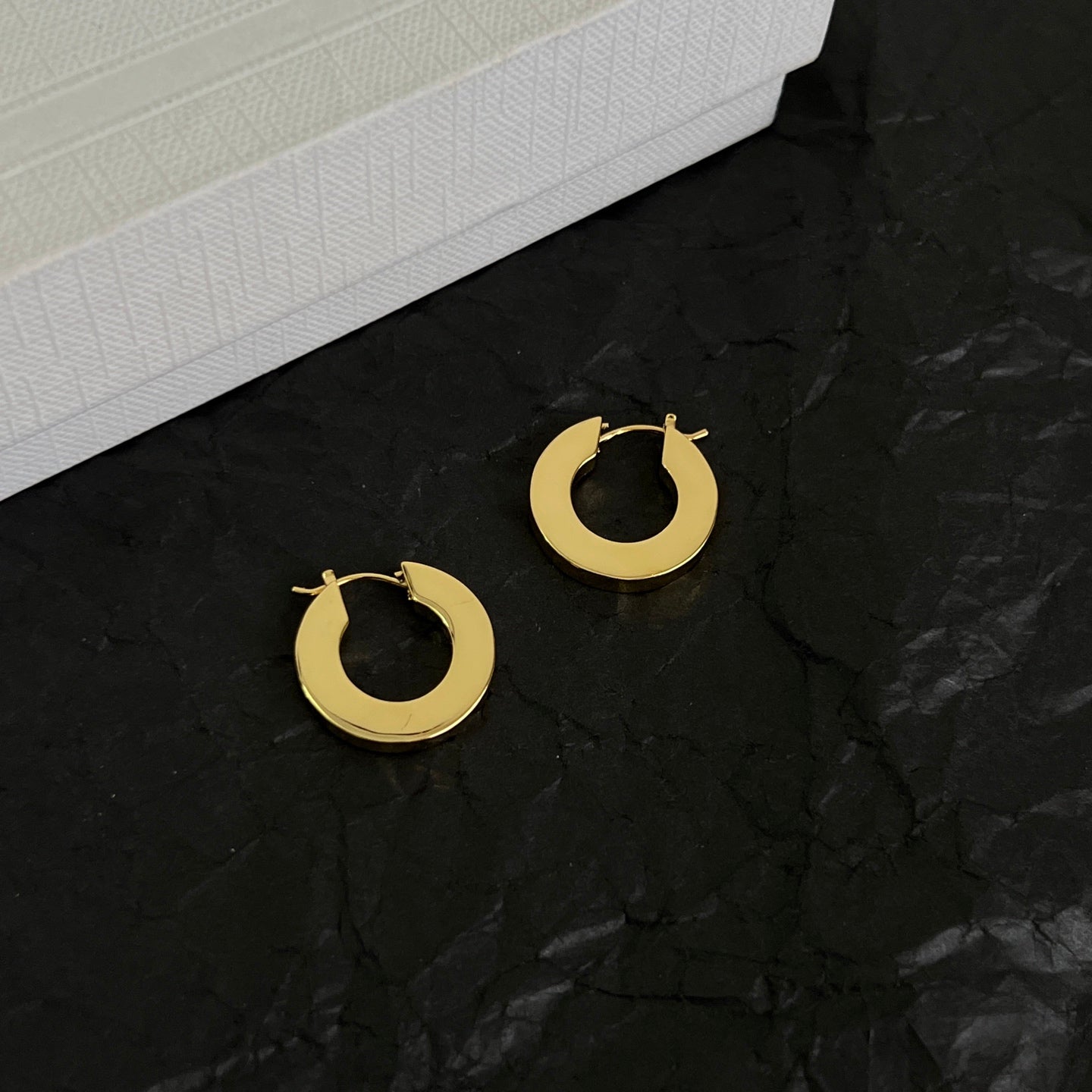 Signature Emblem Statement Earrings in Polished Metal-Tone – Design 01 styled detail