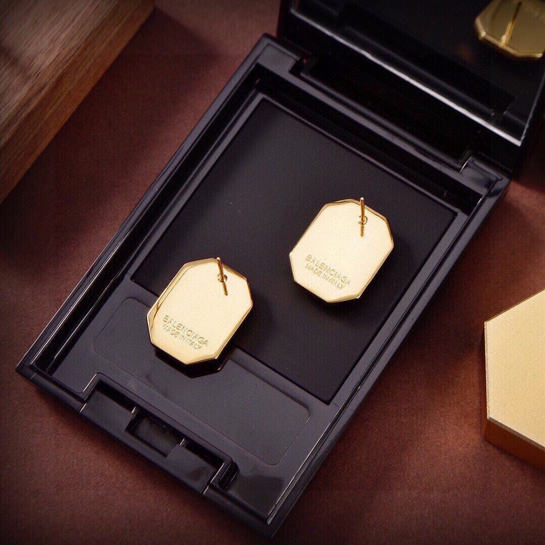 Geometric Emblem Stud Earrings in Gold-Tone – Design 005 close-up detail