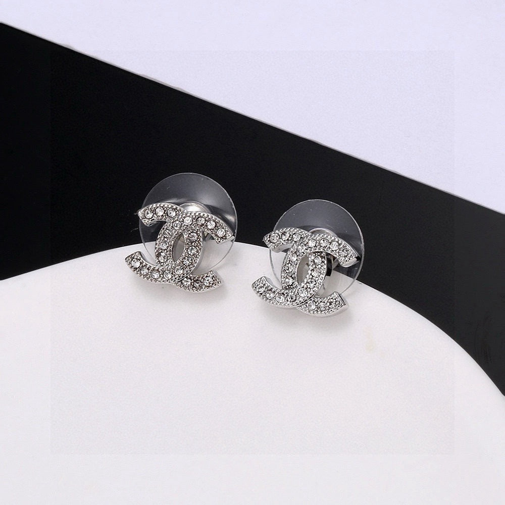Double-C Emblem Stud Earrings in Silver-Tone – Design 004 close-up detail