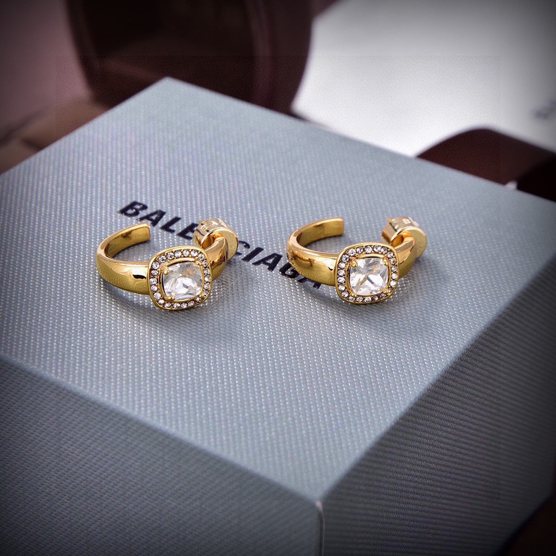 Geometric Emblem Stud Earrings in Gold-Tone – Design 006 close-up detail