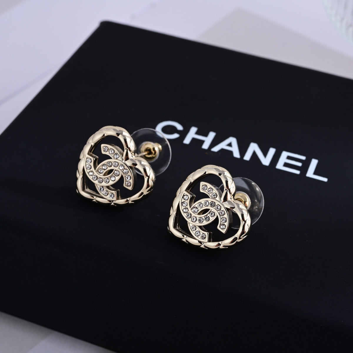 Signature Emblem Stud Earrings in Polished Metal-Tone – Design 057 front product view