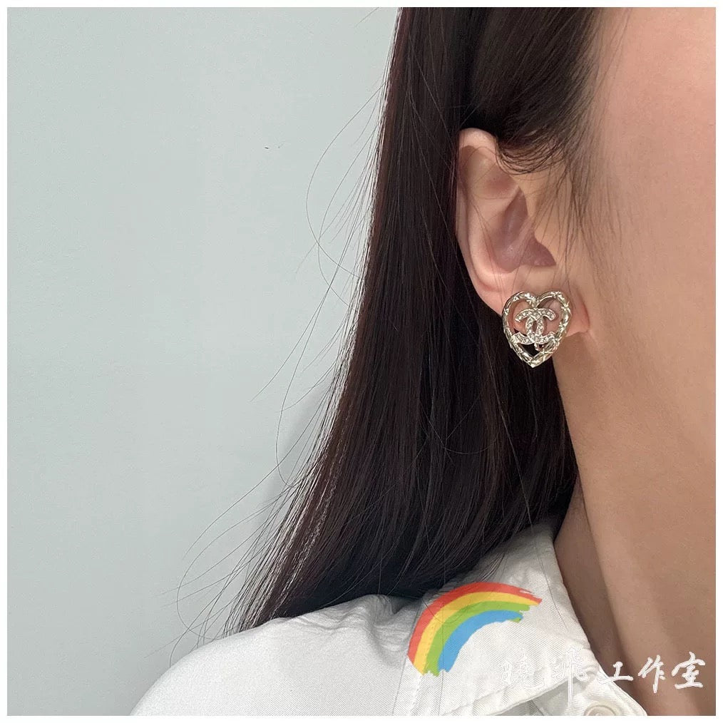 Signature Emblem Stud Earrings in Polished Metal-Tone – Design 057 close-up detail
