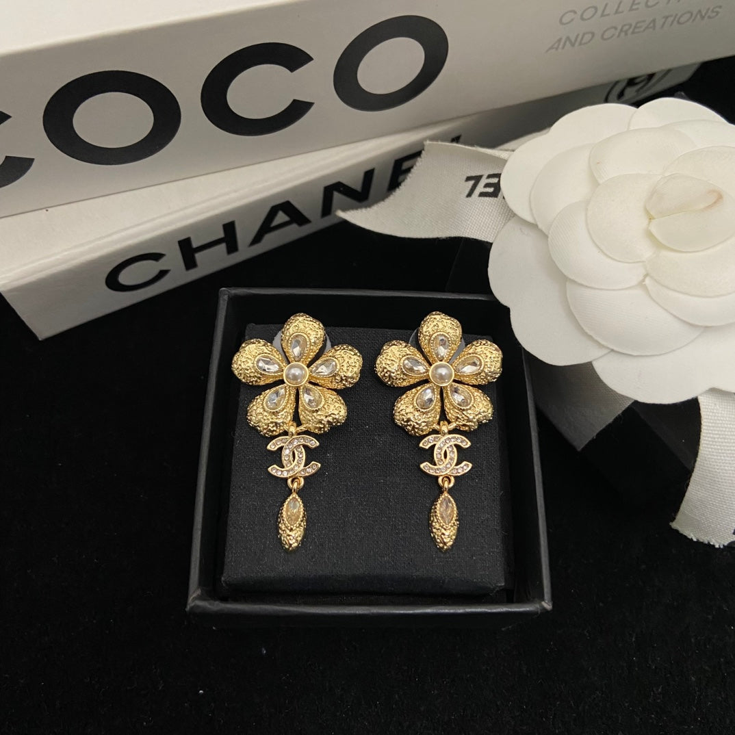 Double-C Emblem Stud Earrings in Polished Metal-Tone – Design 247 front product view