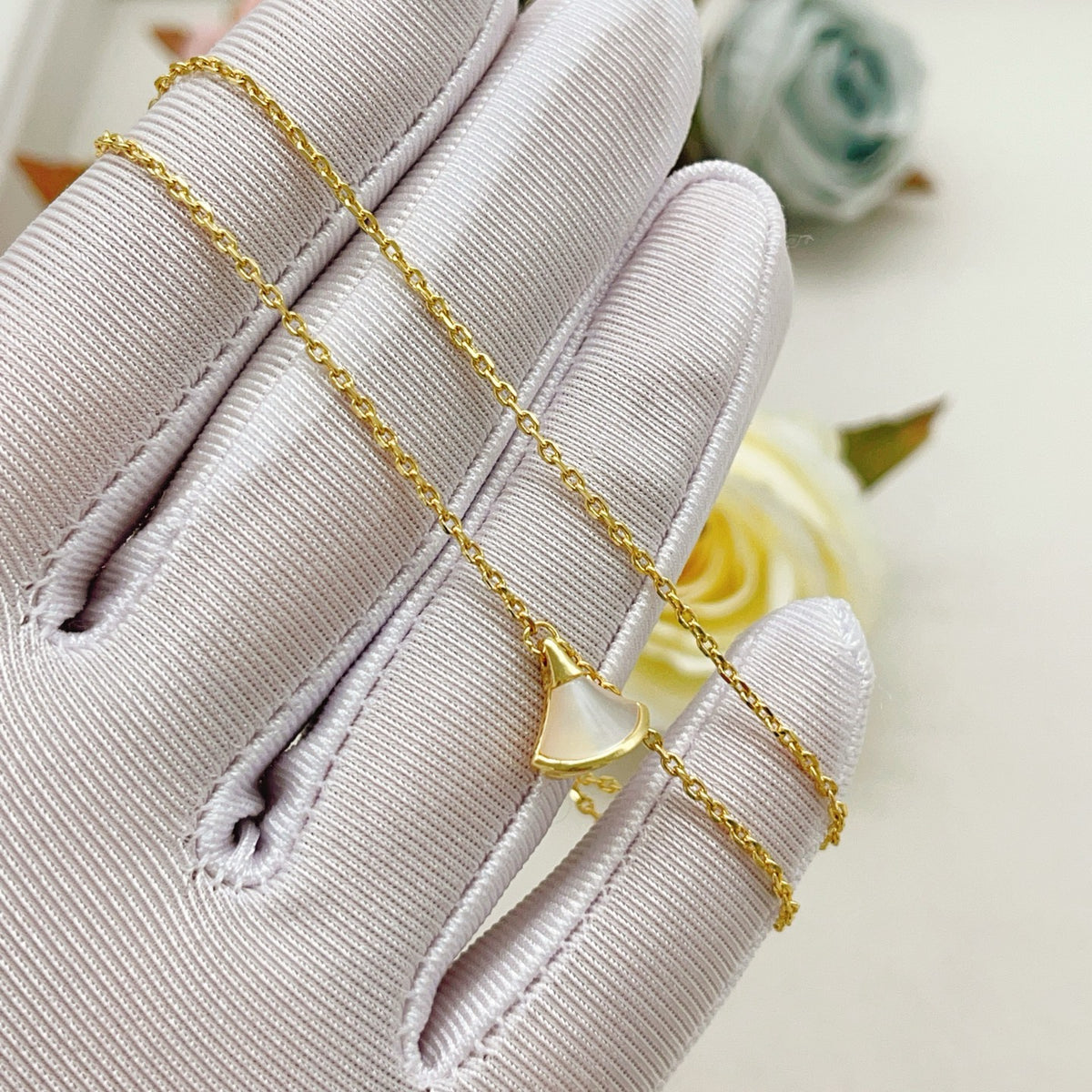 Geometric Emblem Bracelet in Gold-Tone close-up detail
