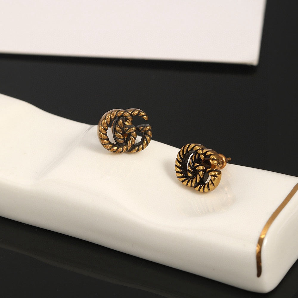 Geometric Emblem Stud Earrings in Polished Metal-Tone – Design 040 front product view
