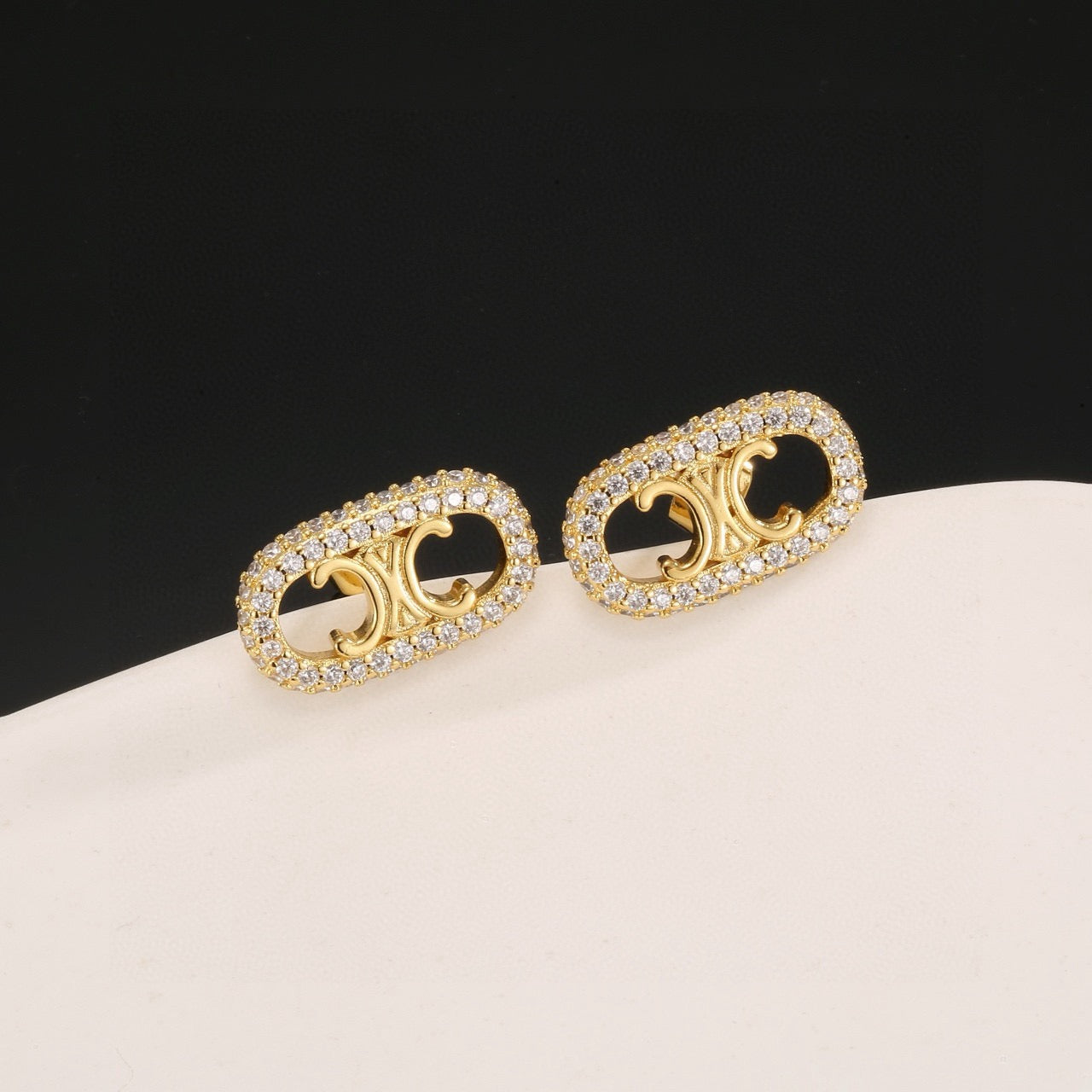 Signature Emblem Stud Earrings in Gold-Tone – Design 05 close-up view