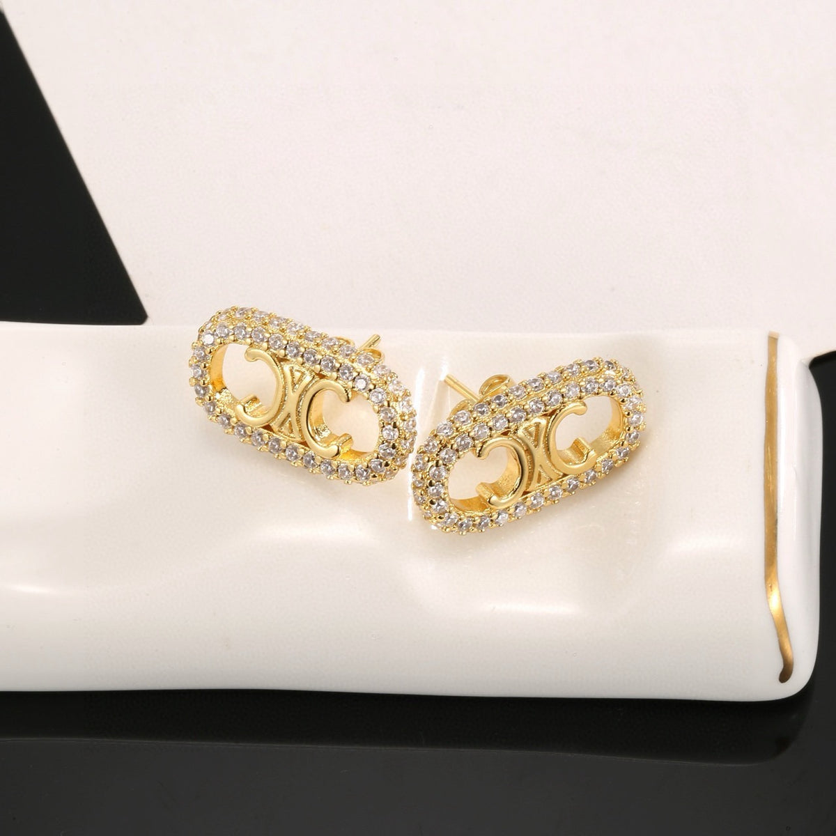 Signature Emblem Stud Earrings in Gold-Tone – Design 05 detail view