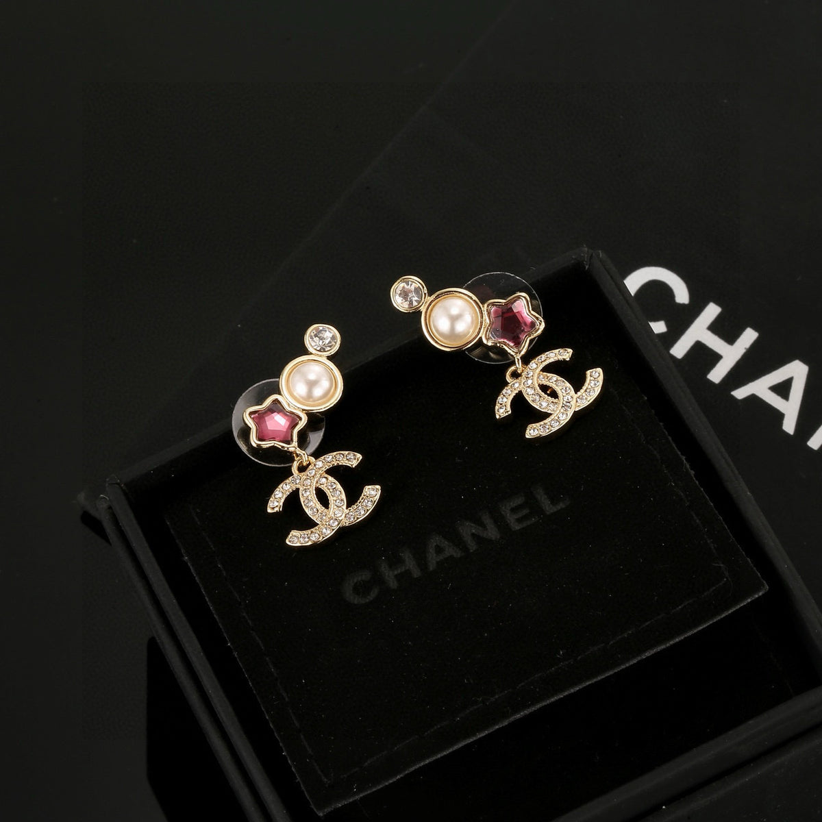 Double-C Emblem Stud Earrings in Gold-Tone – Star Detail – Design 006 main product view