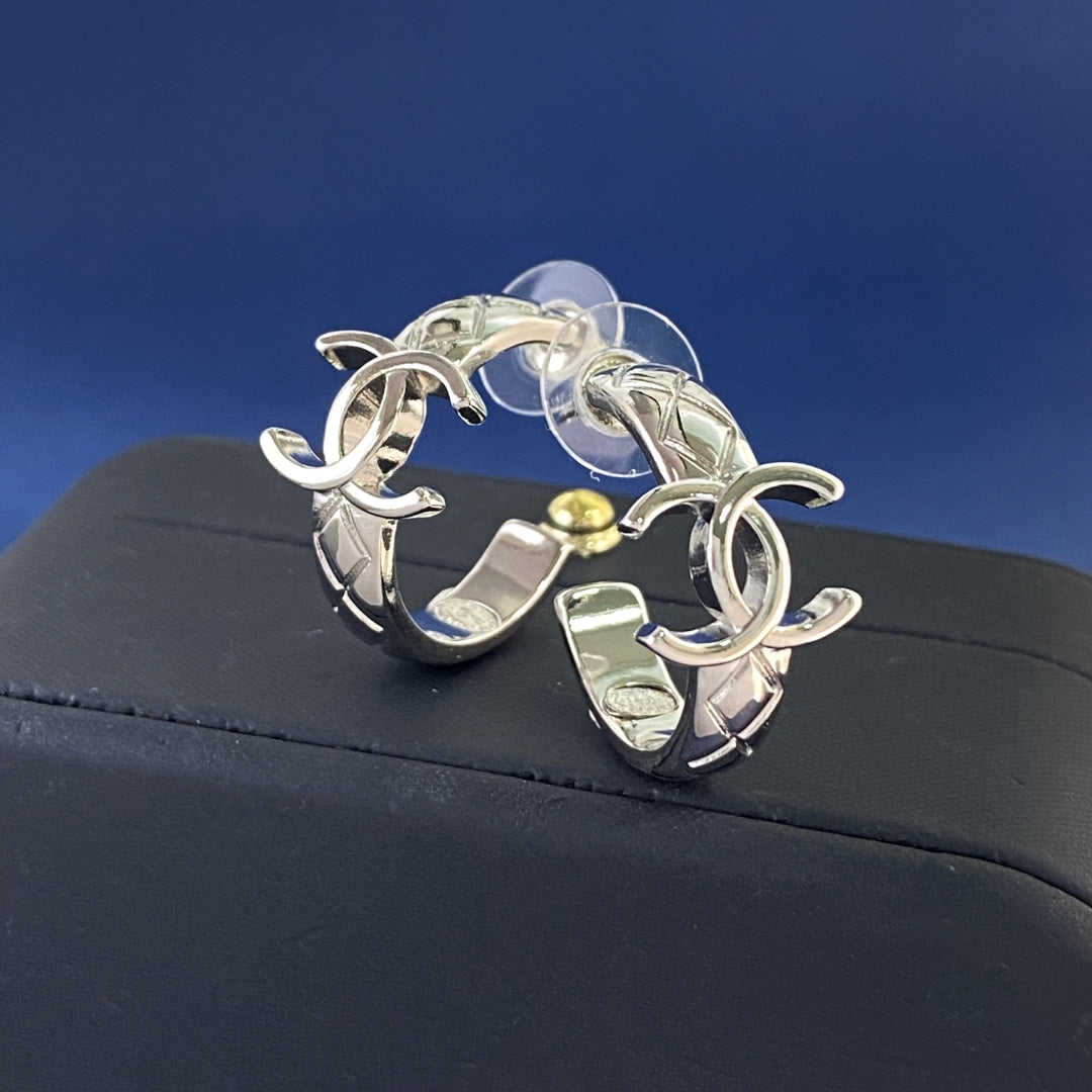 Double-C Emblem Stud Earrings in Silver-Tone – Design 009 detail view