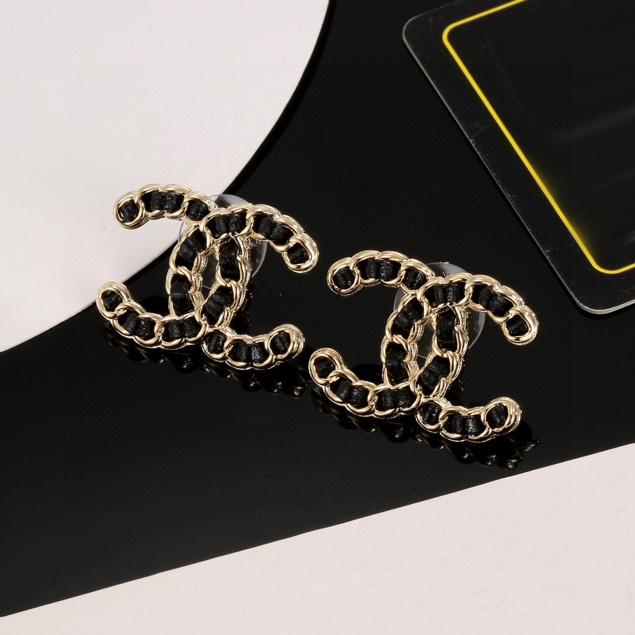 Signature Emblem Stud Earrings in Polished Metal-Tone – Black Detail styled product view