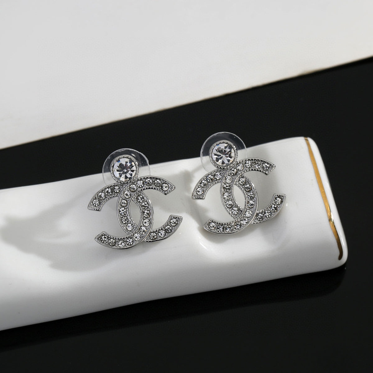 Double-C Emblem Crystal-Accent Stud Earrings – Design 036 close-up detail