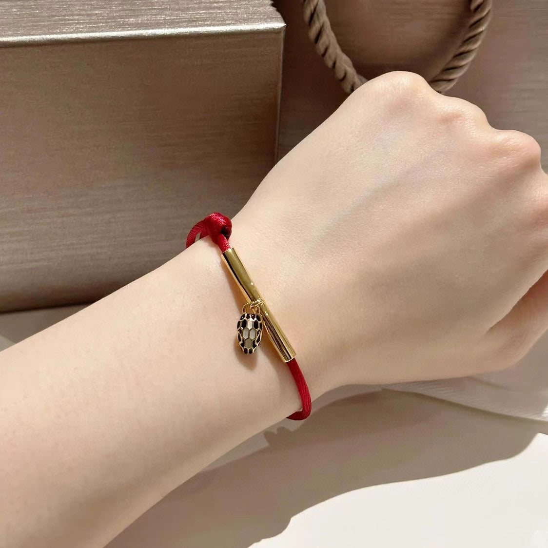 Red Cord Braided Bracelet in Polished Metal-Tone – Red Cord Detail – Design 004 detail view