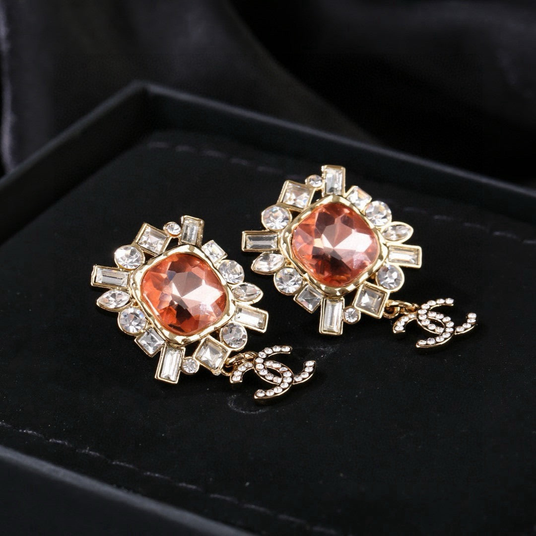 Double-C Emblem Stud Earrings in Gold-Tone – Design 025 side detail