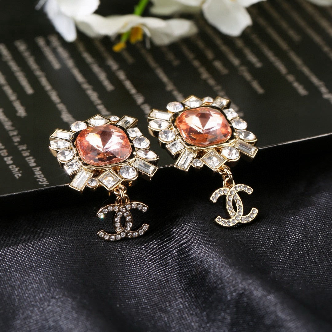 Double-C Emblem Stud Earrings in Gold-Tone – Design 025 close-up detail