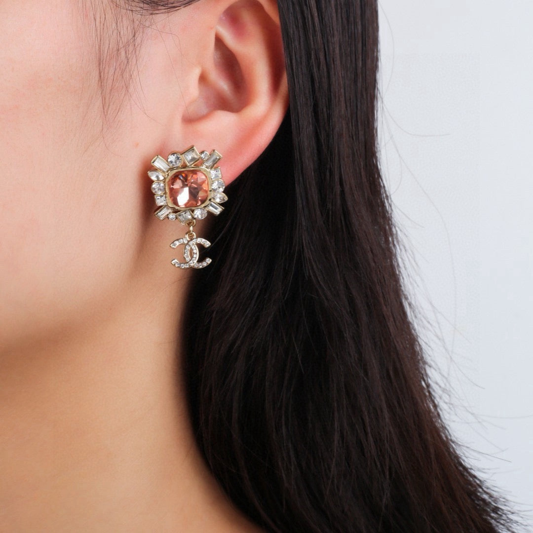 Double-C Emblem Stud Earrings in Gold-Tone – Design 025 front product view