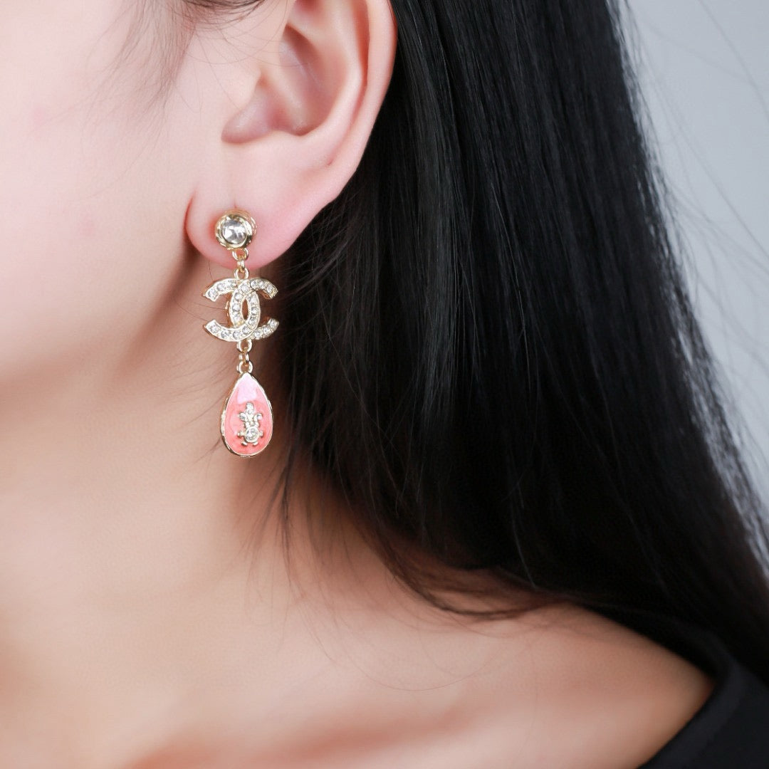 Double-C Emblem Stud Earrings in Gold-Tone – Design 024 detail view