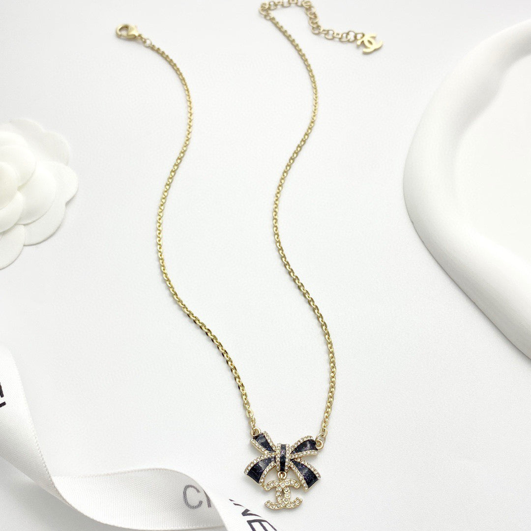 Bow Pendant Necklace in Black-Tone front product view