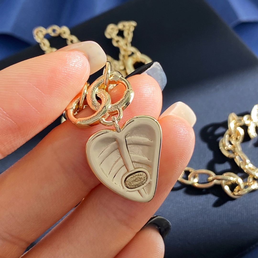 Double-C Emblem Pendant Necklace in Gold-Tone – Heart Detail – Design 002 side detail