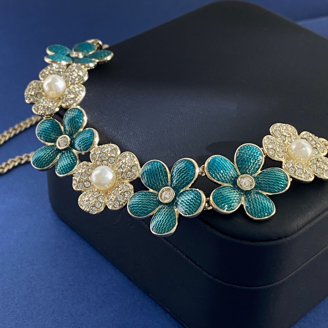 Double-C Emblem Pearl-Detail Pendant Necklace – Pearl Detail – Design 112 styled product view