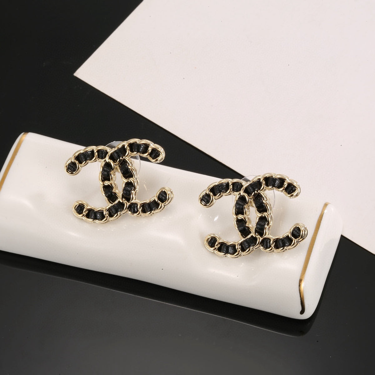 Signature Emblem Stud Earrings in Polished Metal-Tone – Black Detail – Design 002 front product view
